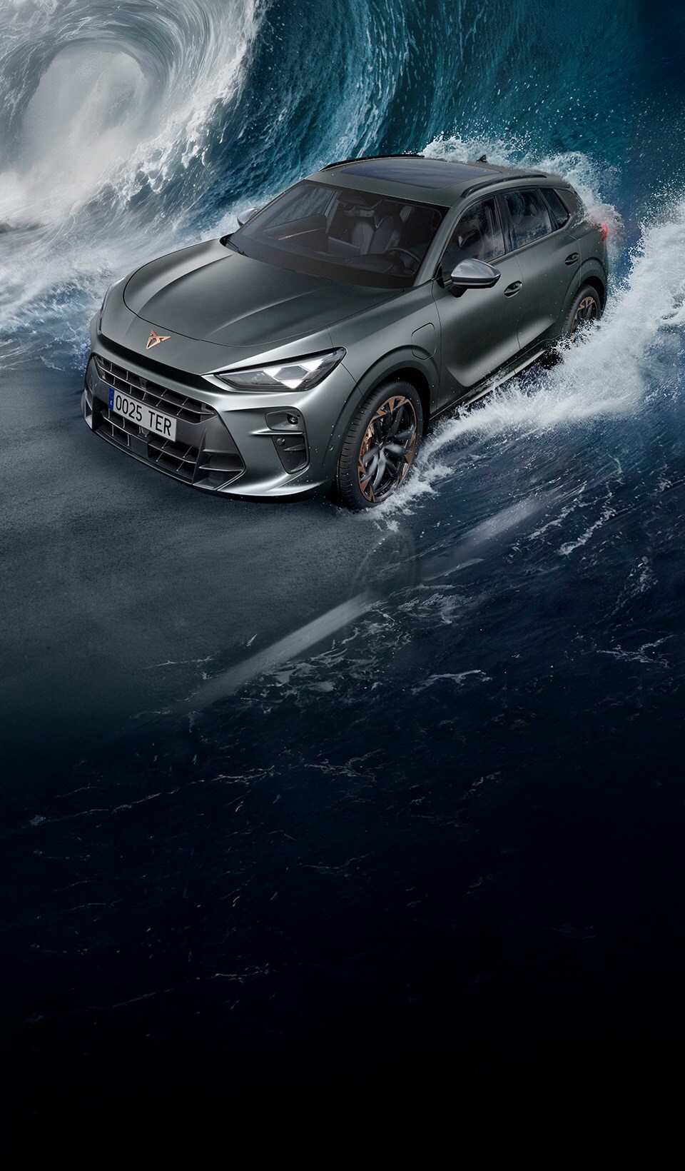 A CUPRA Leon hatchback seen from an elevated angle with its headlights on, next to a person covered in dark, flowing fabric that drapes onto the ground.